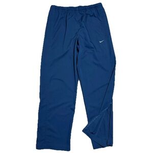 VTG Blue Nike Athletic Track Pants Size M Ankle Zip Swoosh Baggy Windbreaker Y2K